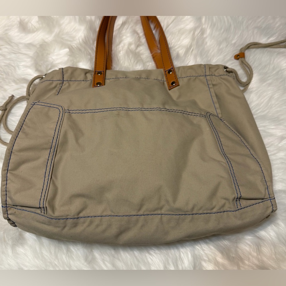 Lacoste Beige Canvas Sportsman Drawstring Tote with Tan Leather Handles - Picture 11 of 14